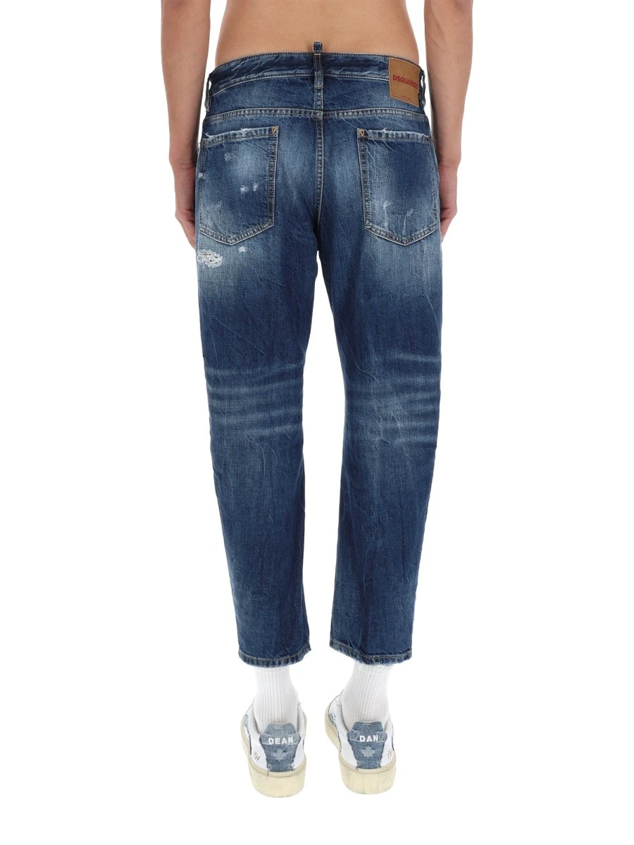 JEANS WITH "DESTROYED" DETAILS.webp