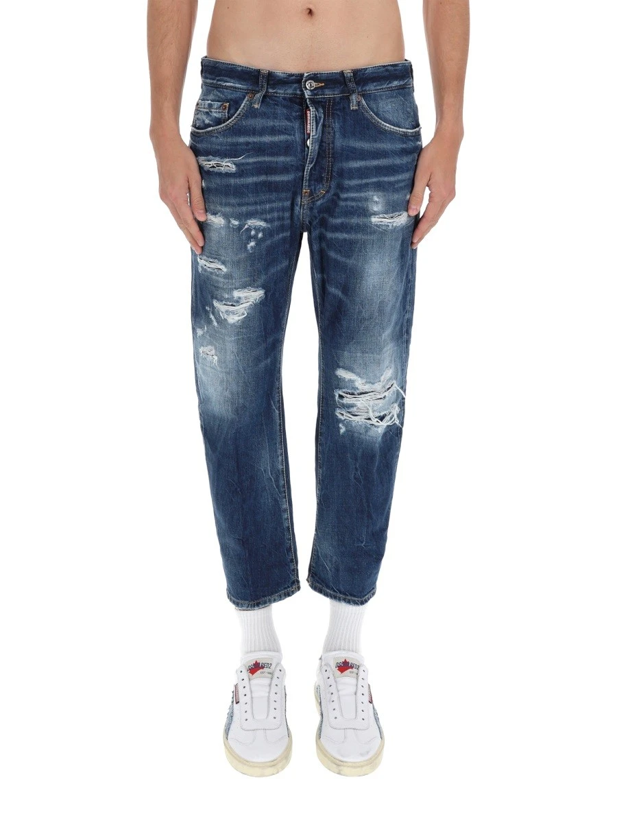 JEANS WITH "DESTROYED" DETAILS.webp