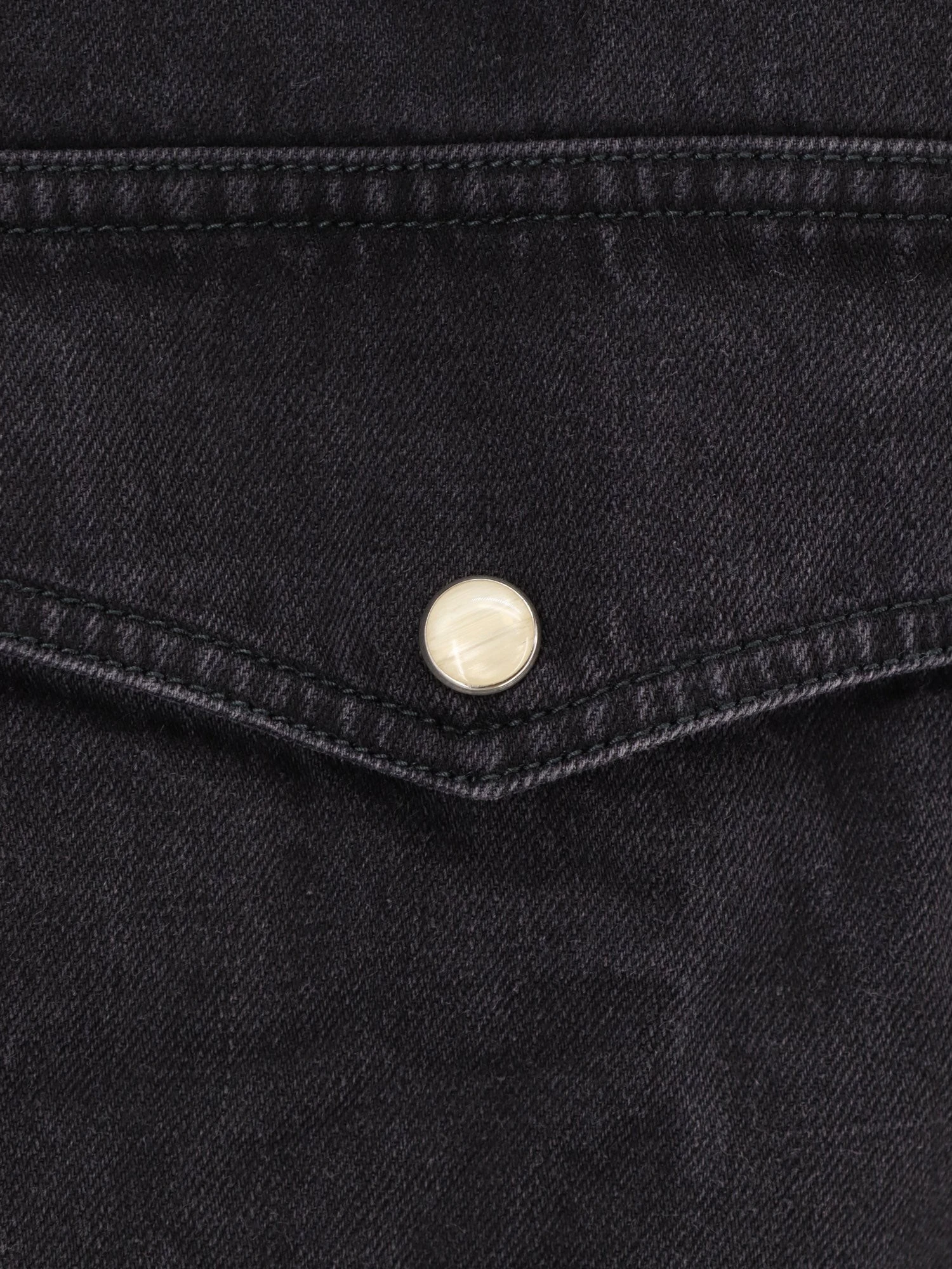 Black denim shirt with enamelled buttons.webp