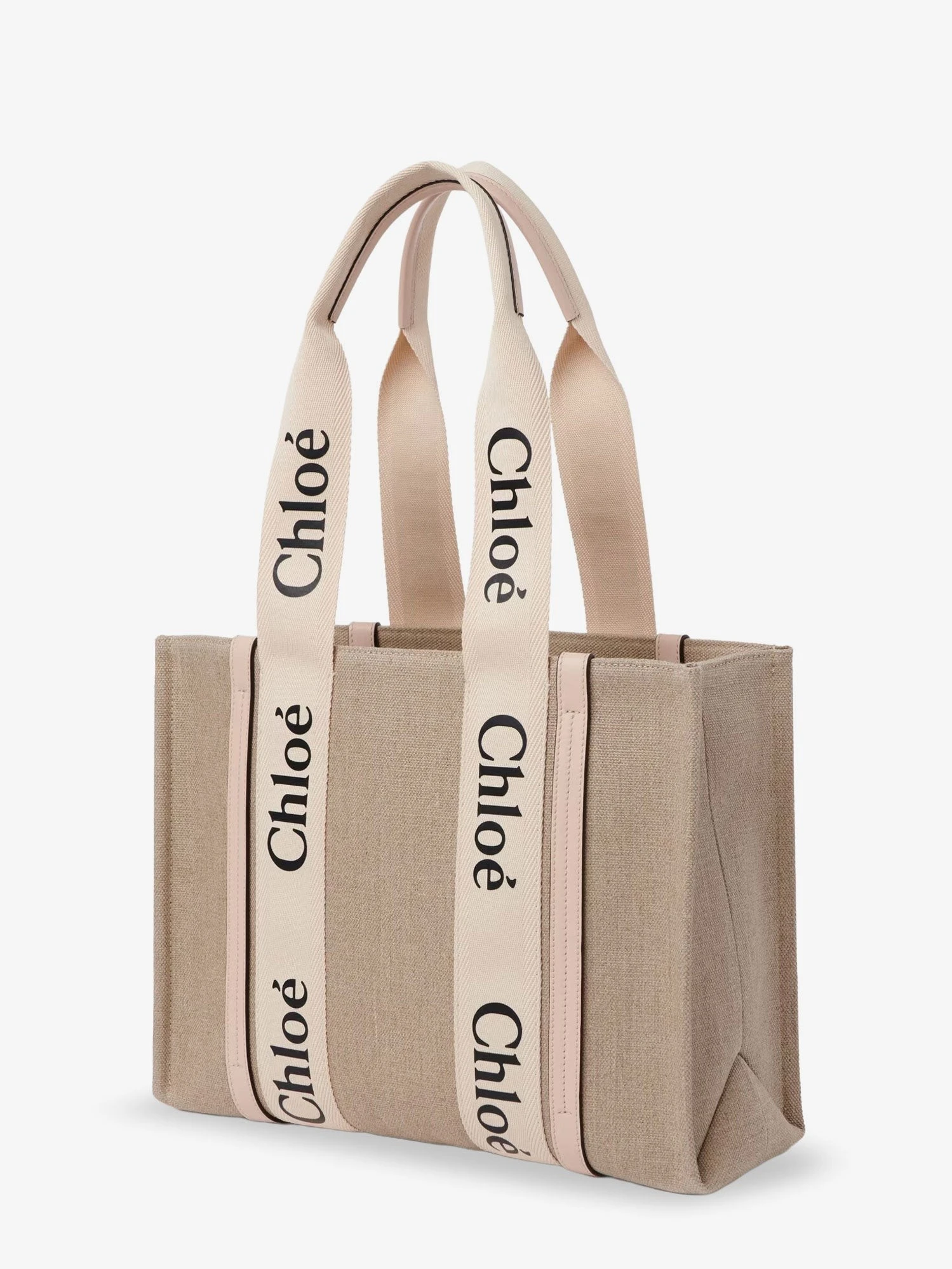 Woody linen shoulder bag with leather inserts.webp