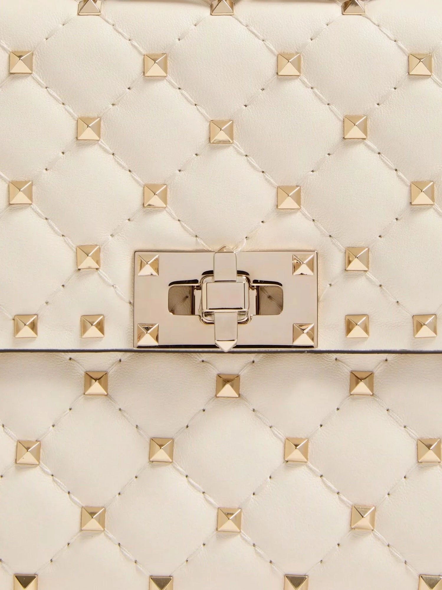 Rockstud Spike leather crossbody bag with iconic all-over studs.webp