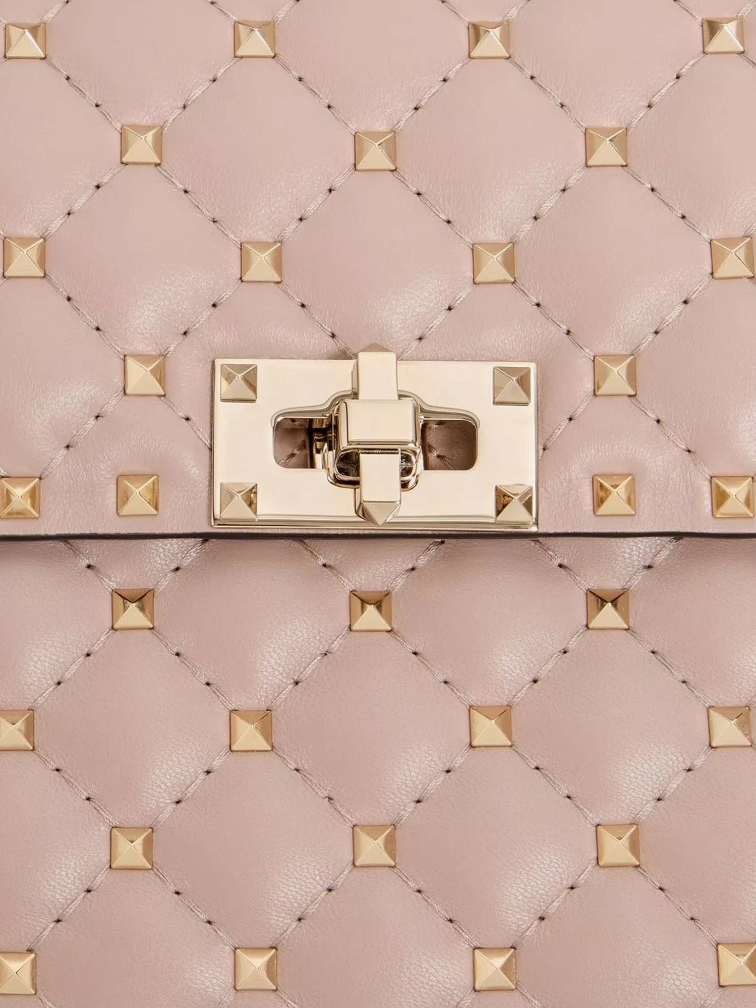 Rockstud Spike leather crossbody bag with iconic all-over studs.webp