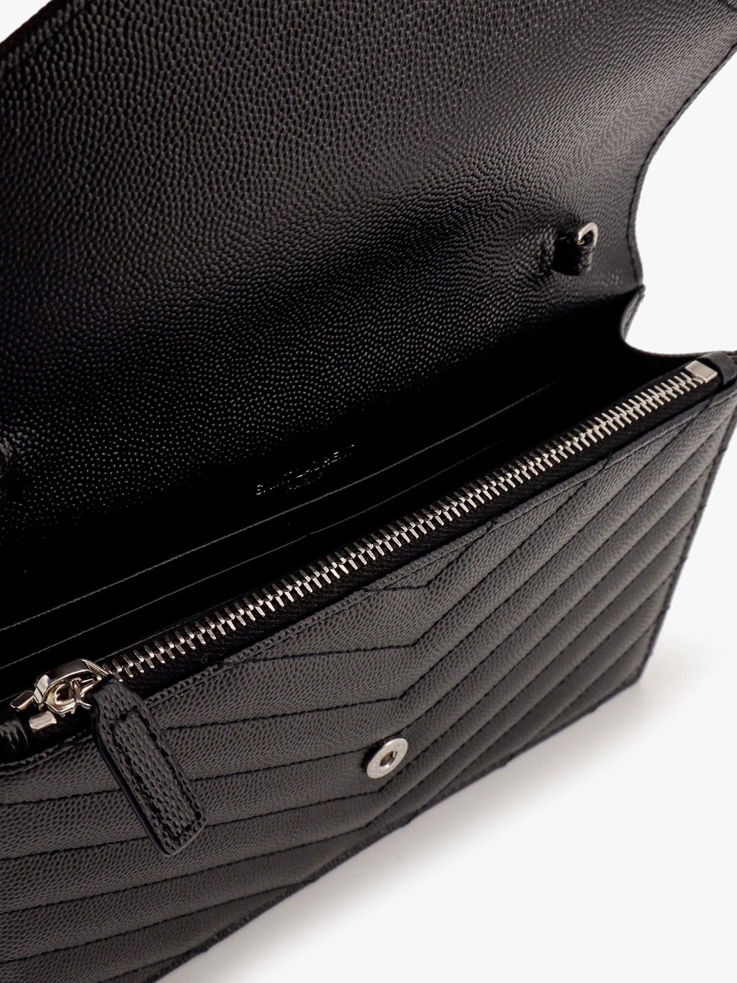 Pochette Cassandre grain-de-poudre leather clutch with shoulder strap.webp