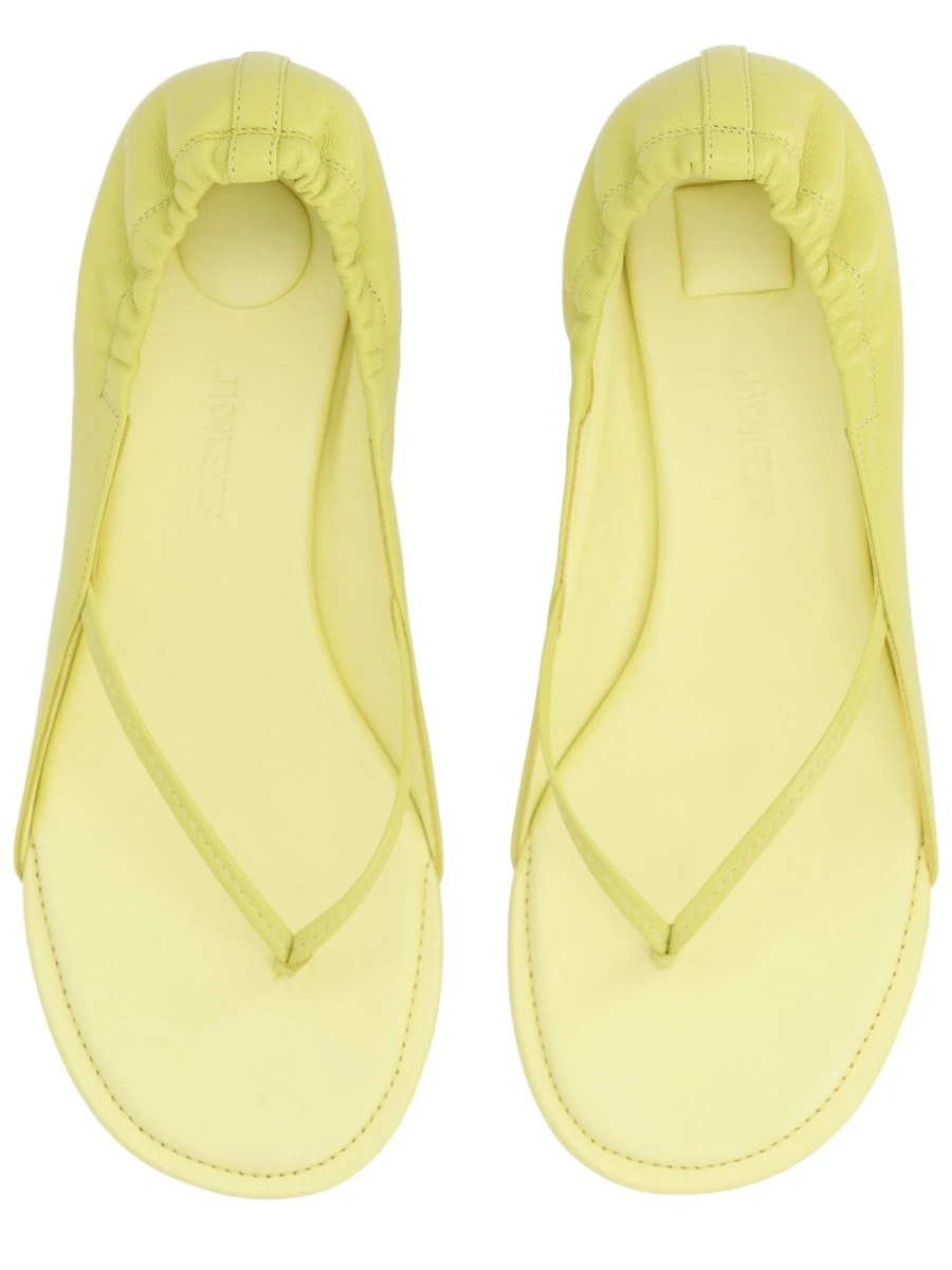 SANDALO CON TACCO.webp