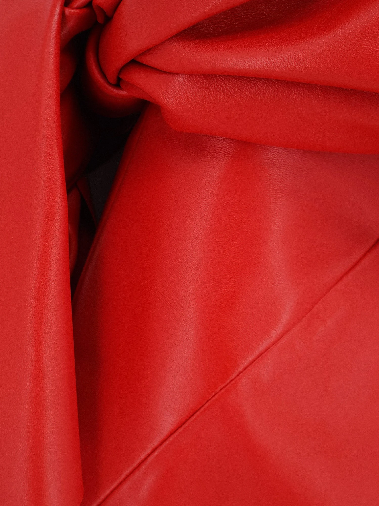 Leather bustier dress with bow detail.webp