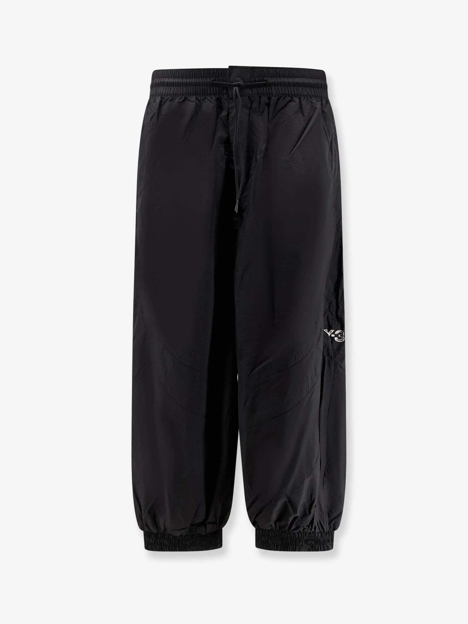 Baggy nylon trousers.webp