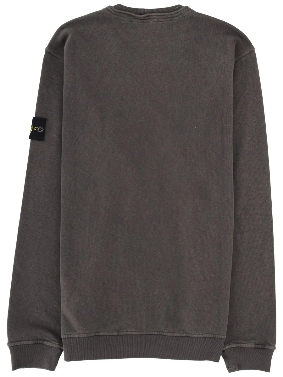 FELPA CON PATCH LOGO.webp