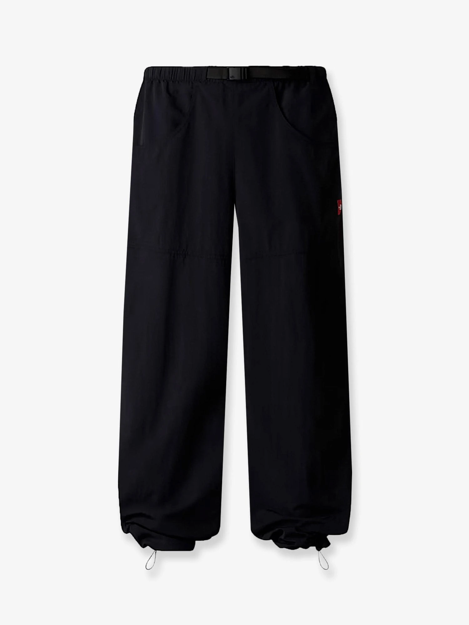 Nylon trousers with front logo patch.webp