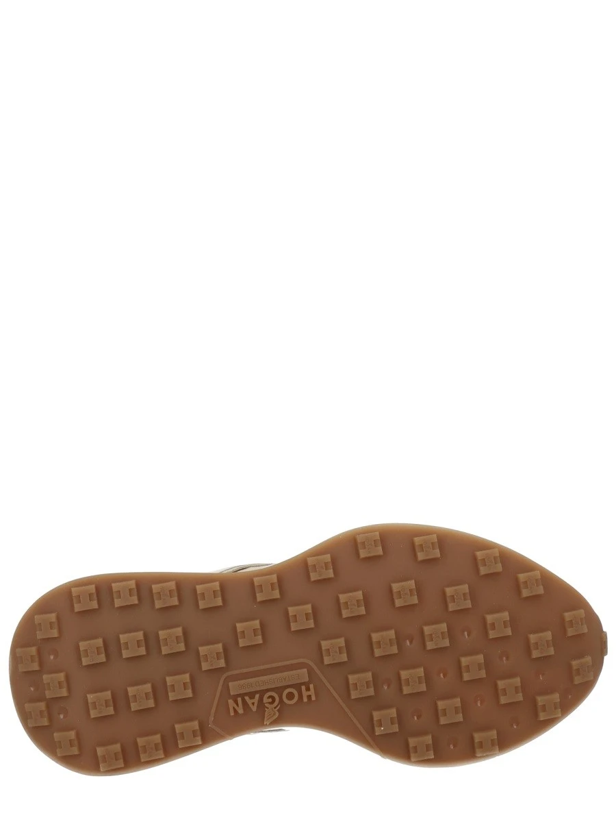 Silk trousers with monogram logo embroidery.webp