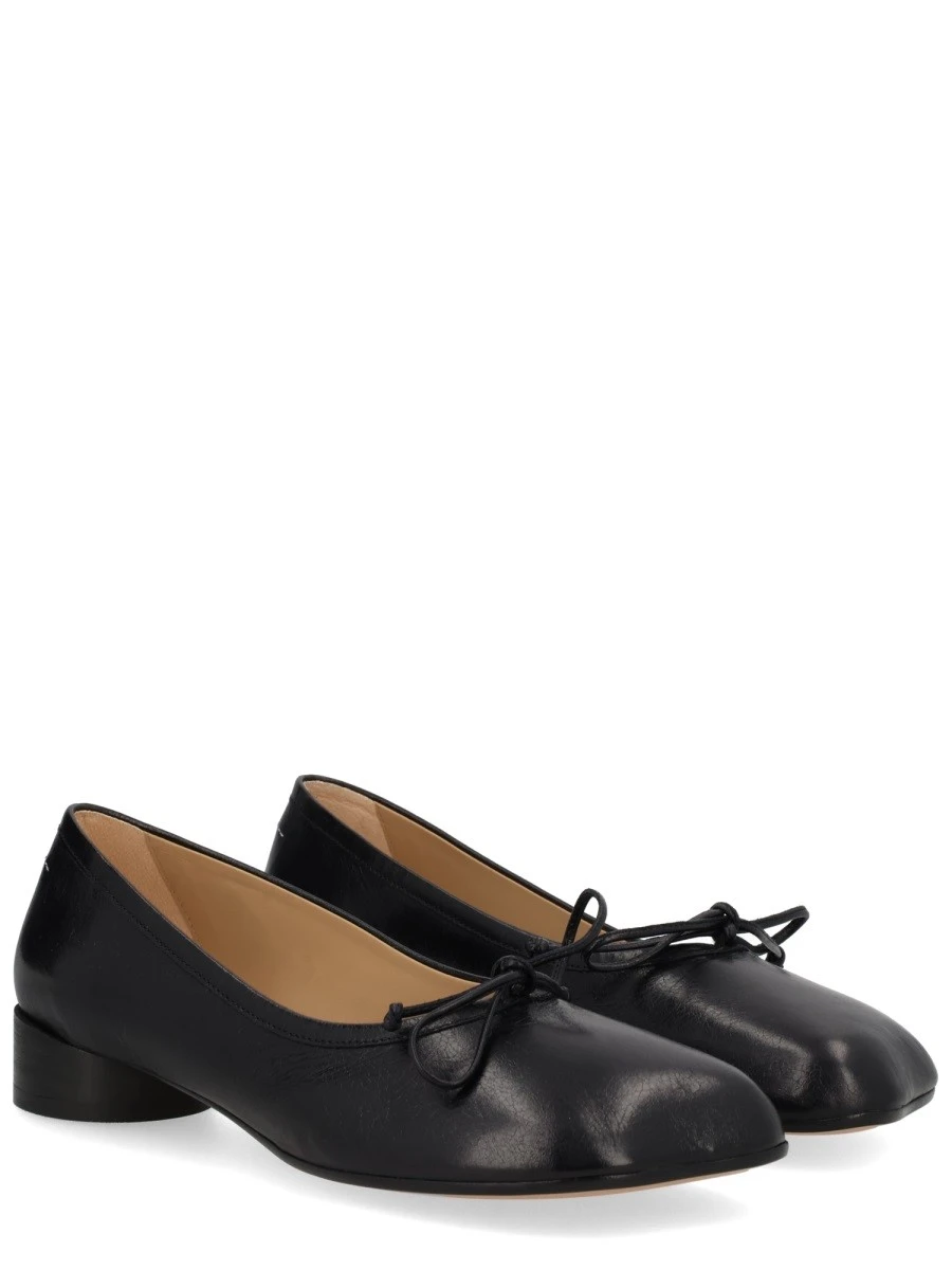 Small N/S Park Tote hammered leather bucket bag.webp