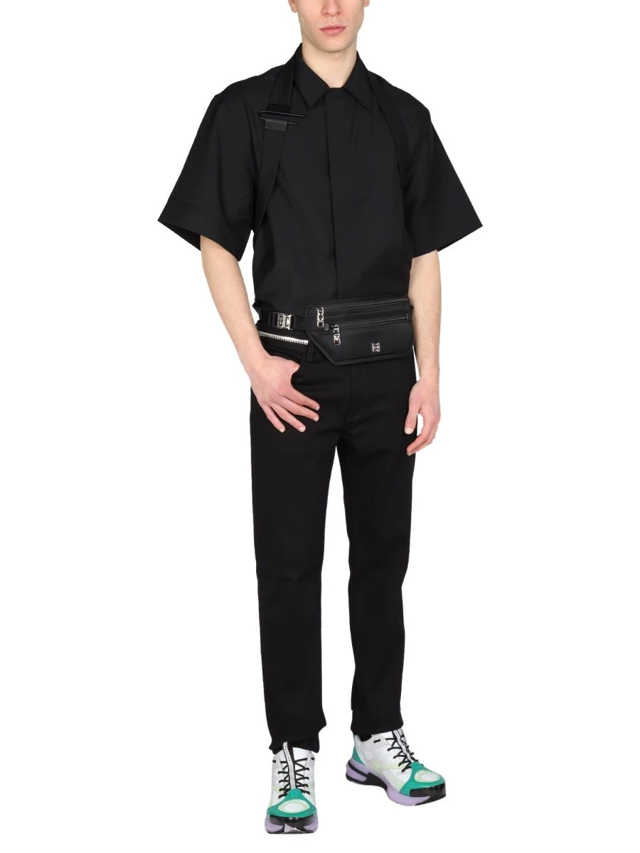 SLIM FIT JEANS WITH METALLIC DETAILS.webp