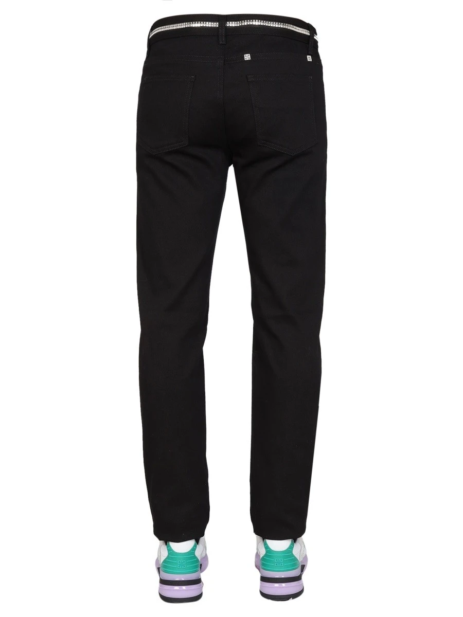 SLIM FIT JEANS WITH METALLIC DETAILS.webp