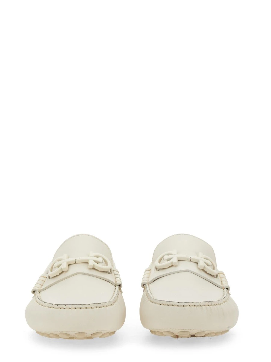 MOCCASIN WITH GANCINI ORNAMENT.webp