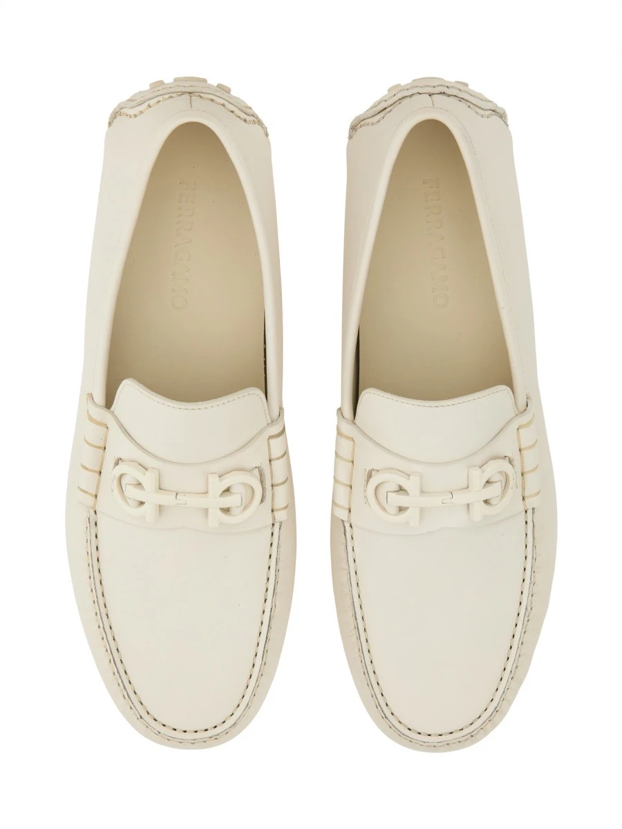 MOCCASIN WITH GANCINI ORNAMENT.webp