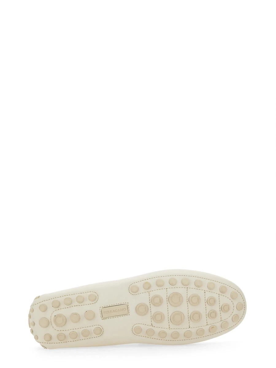 MOCCASIN WITH GANCINI ORNAMENT.webp