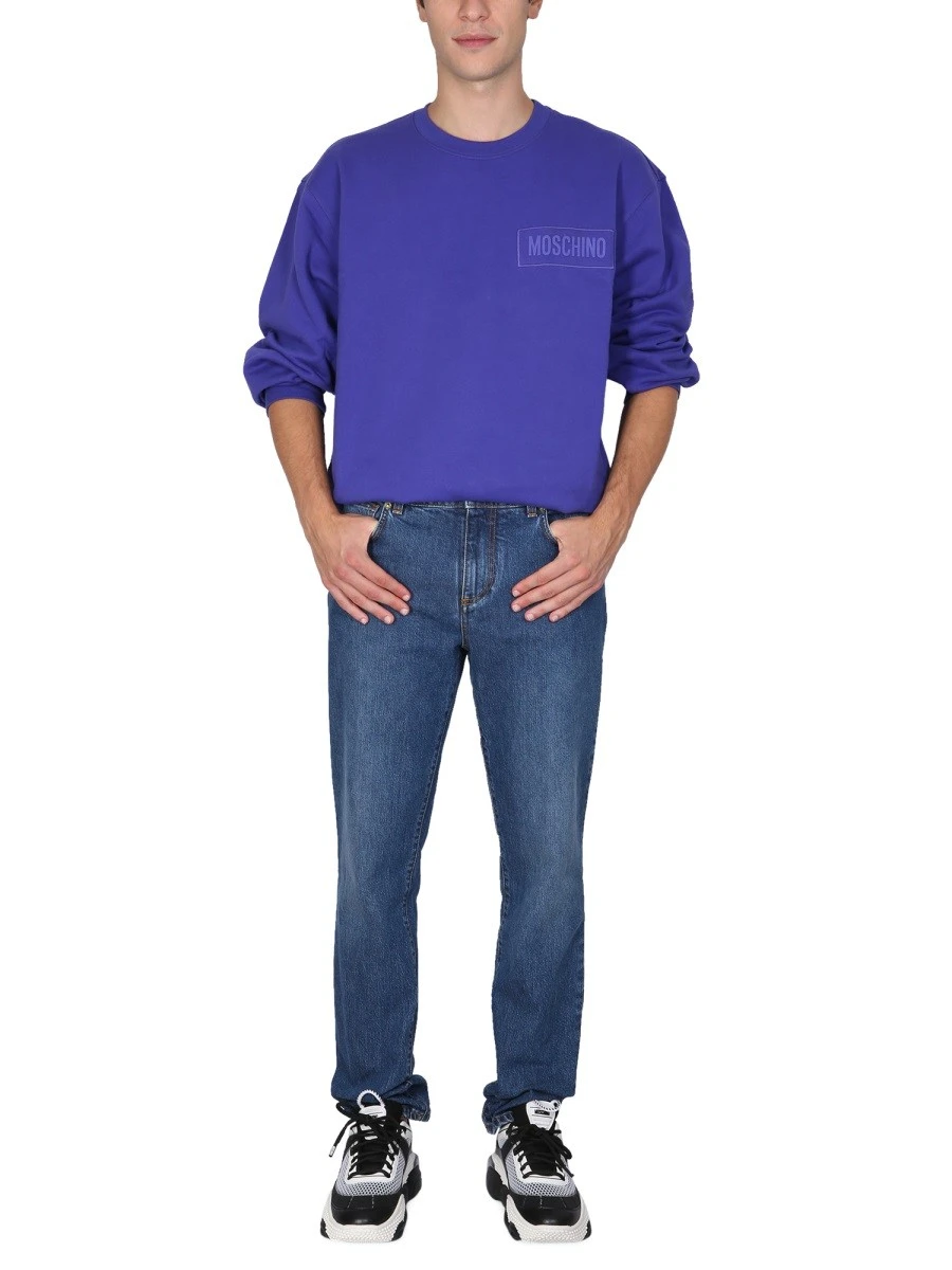 SWEATSHIRT WITH LOGO PATCH.webp