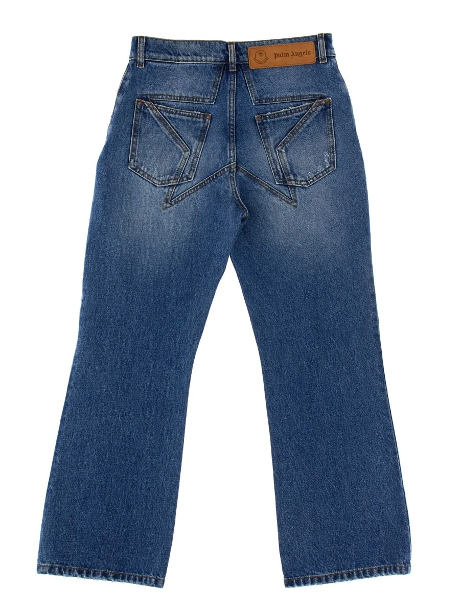 JEANS WITH STAR INLAYS 8 MONCLER PALM ANGELS.webp