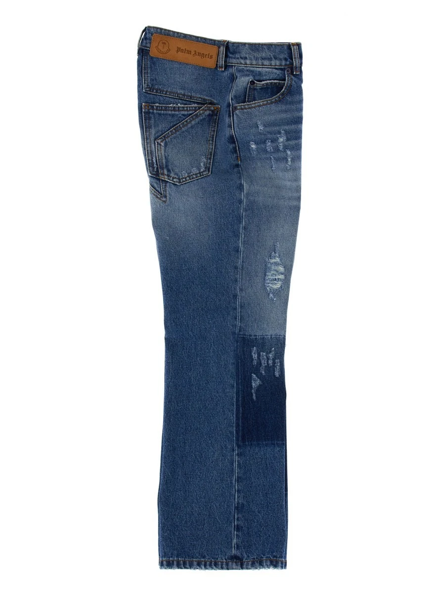 JEANS WITH STAR INLAYS 8 MONCLER PALM ANGELS.webp