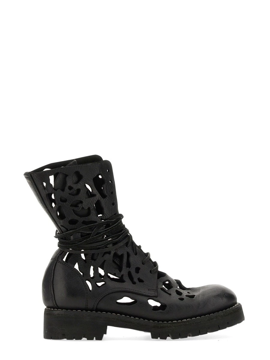 ANKLE BOOT WITH CUT OUT DETAILS.webp