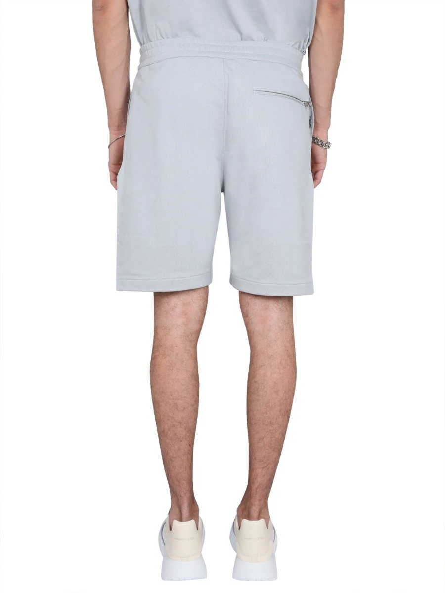 BERMUDA SHORTS WITH GRAFFITI LOGO PRINT.webp
