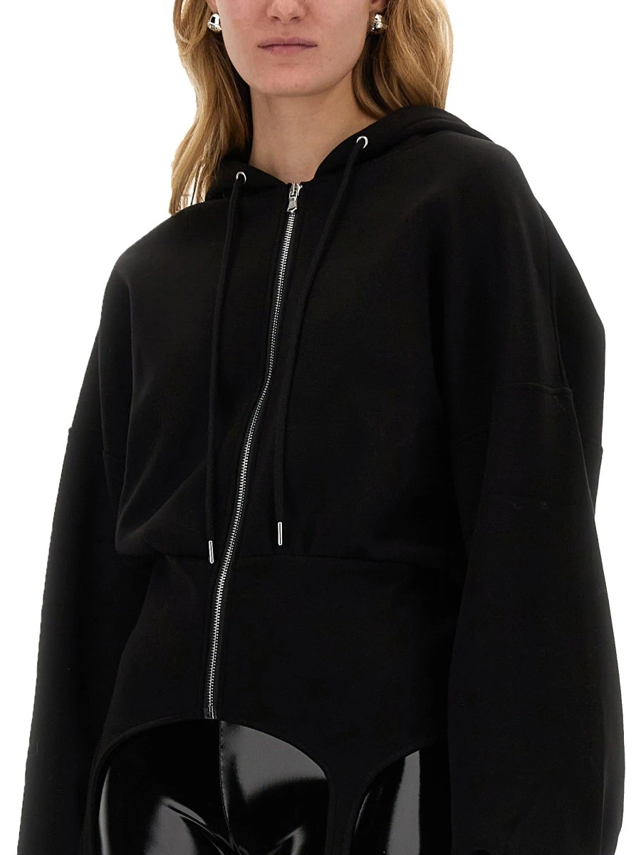 SWEATSHIRT WITH SUSPENDERS.webp