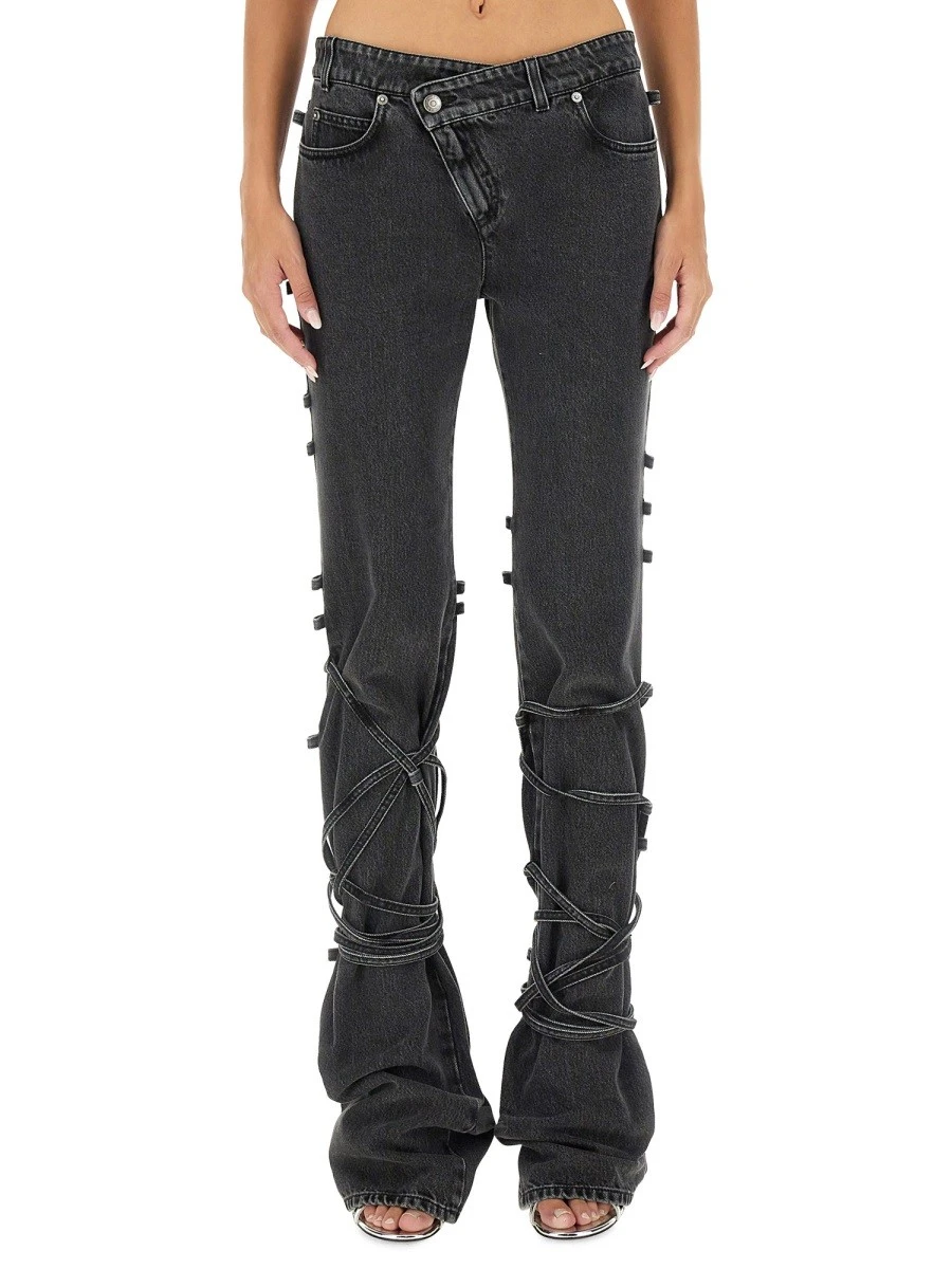 JEANS WITH KNOTTED DETAIL.webp