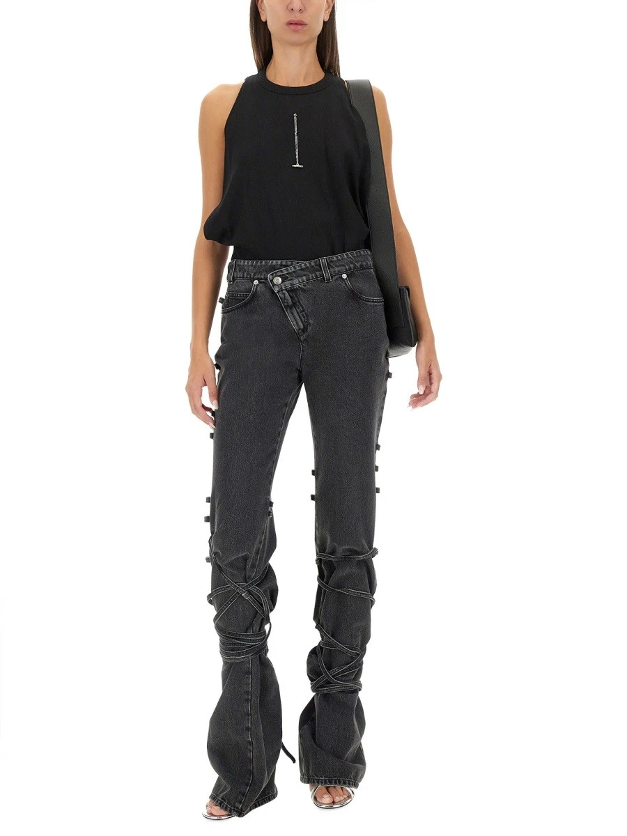JEANS WITH KNOTTED DETAIL.webp