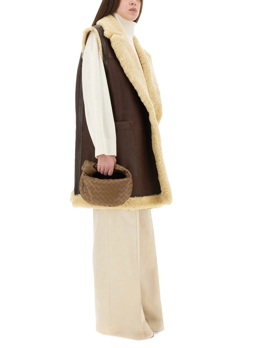 LEATHER AND SHEARLING VEST.webp