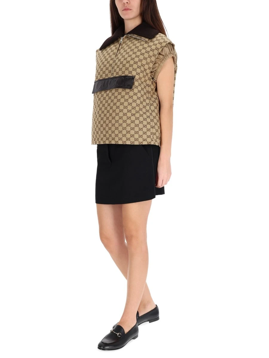 VEST WITH LEATHER LABEL.webp