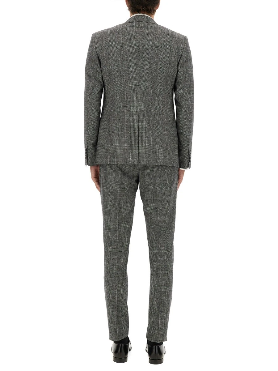 THREE-PIECE SUIT.webp