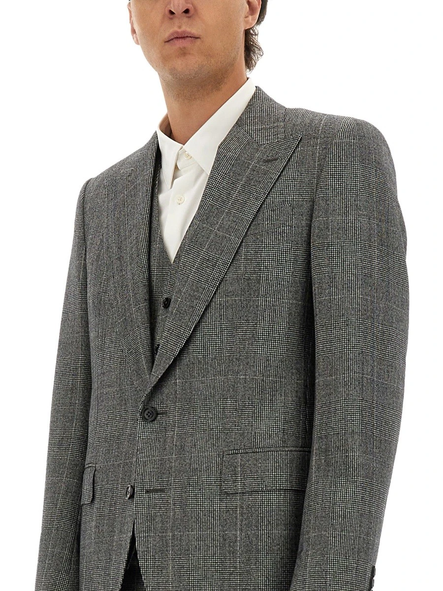 THREE-PIECE SUIT.webp