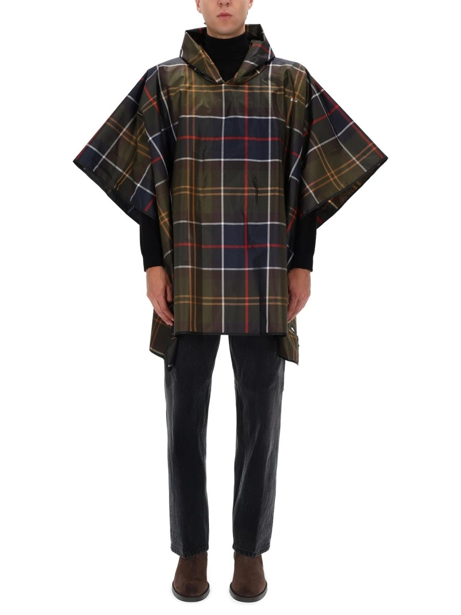 PONCHO WITH TARTAN PATTERN.webp
