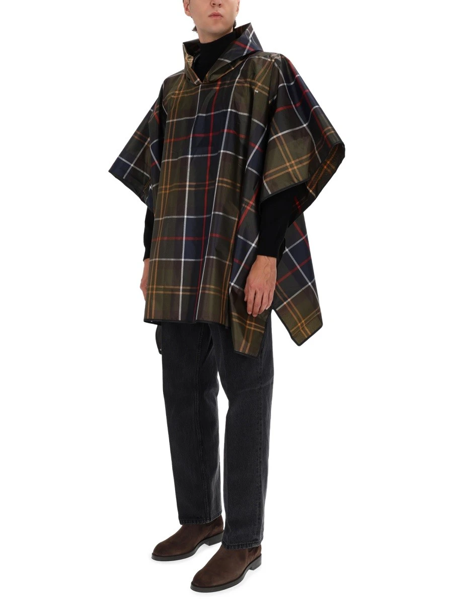 PONCHO WITH TARTAN PATTERN.webp