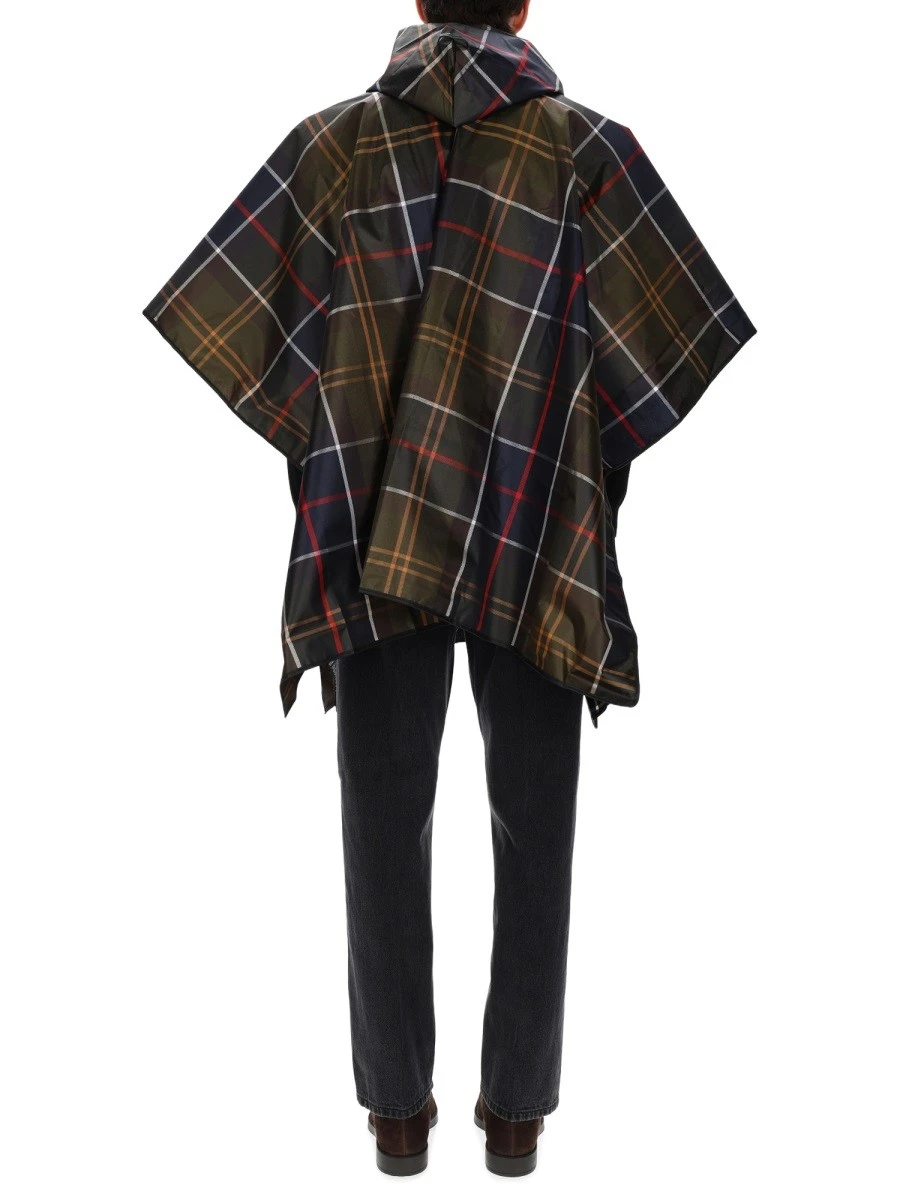 PONCHO WITH TARTAN PATTERN.webp