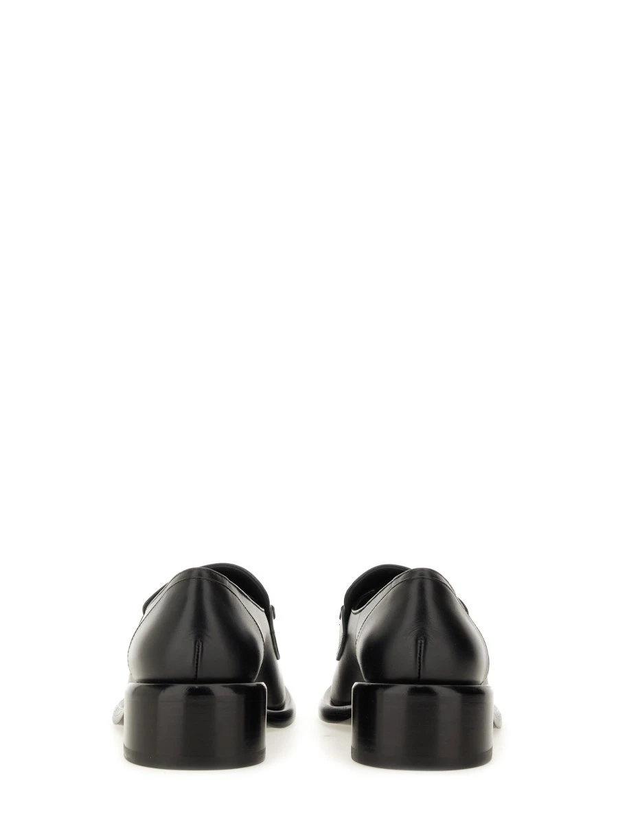 MOCCASIN WITH CLAMP.webp