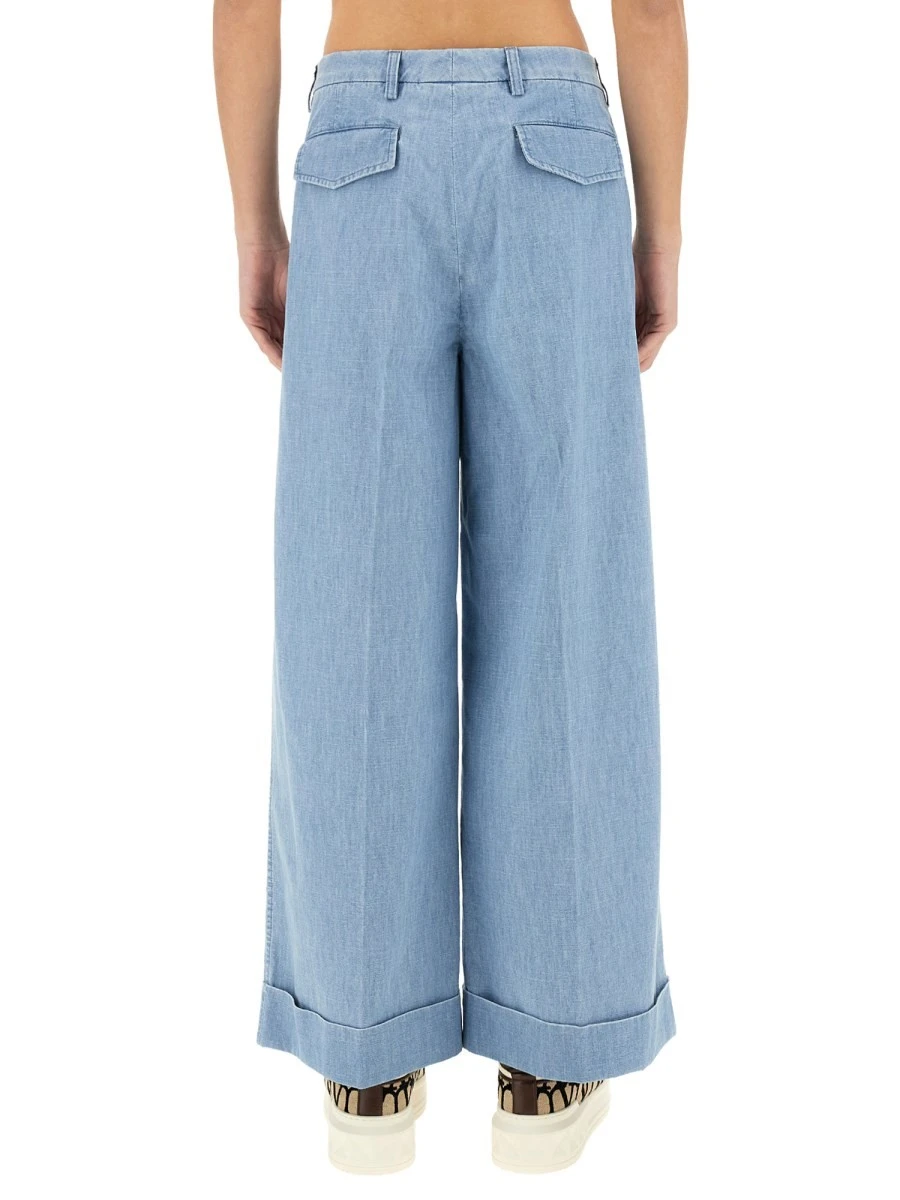 DENIM PANTS WITH LAPELS.webp
