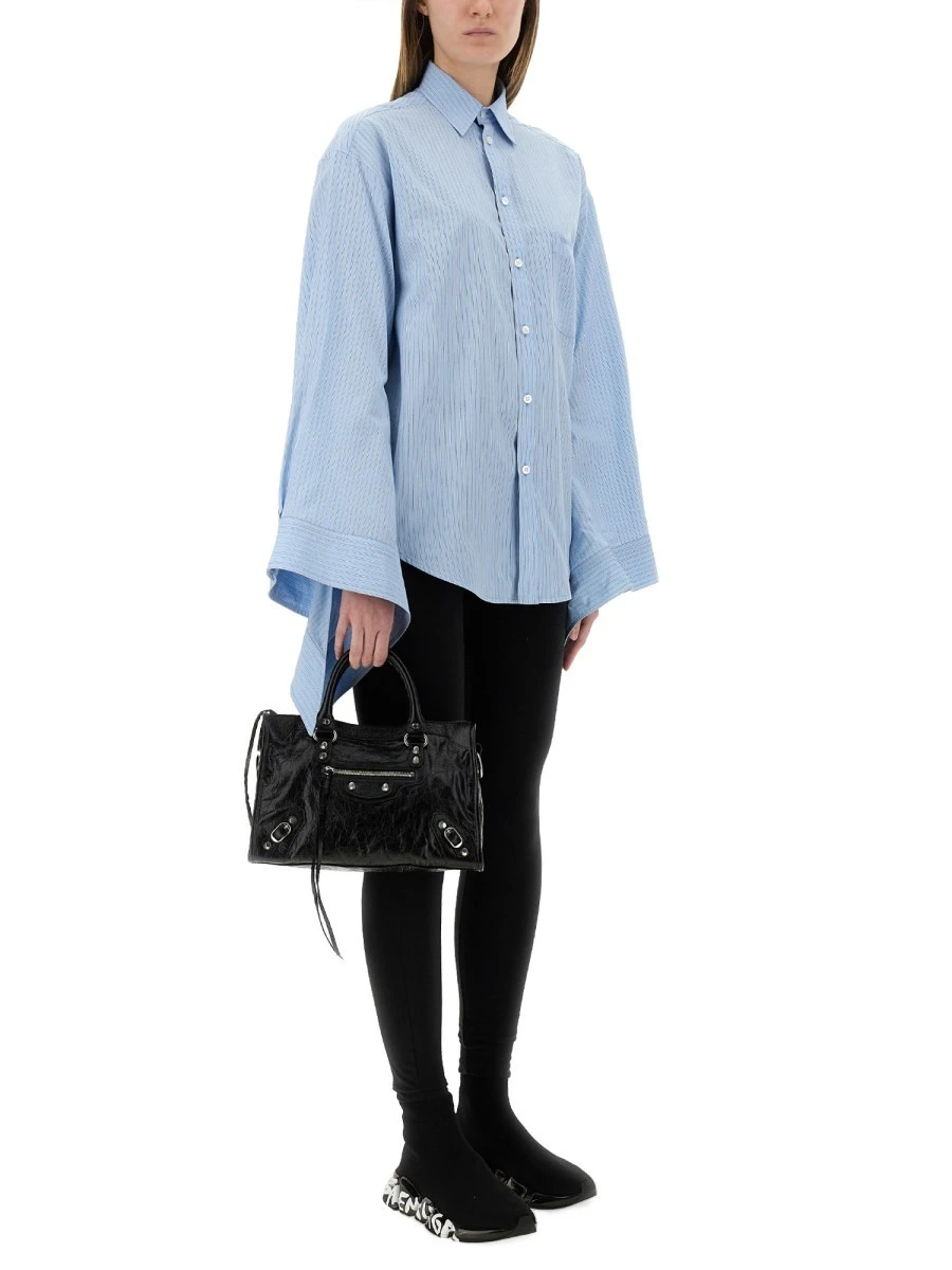 BLOUSE WITH KNOTTED CUFFS.webp