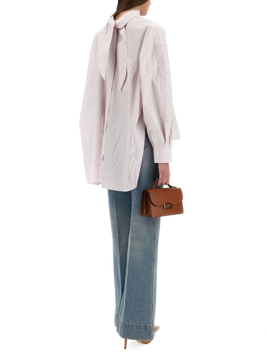 BLOUSE WITH KNOTTED COLLAR.webp