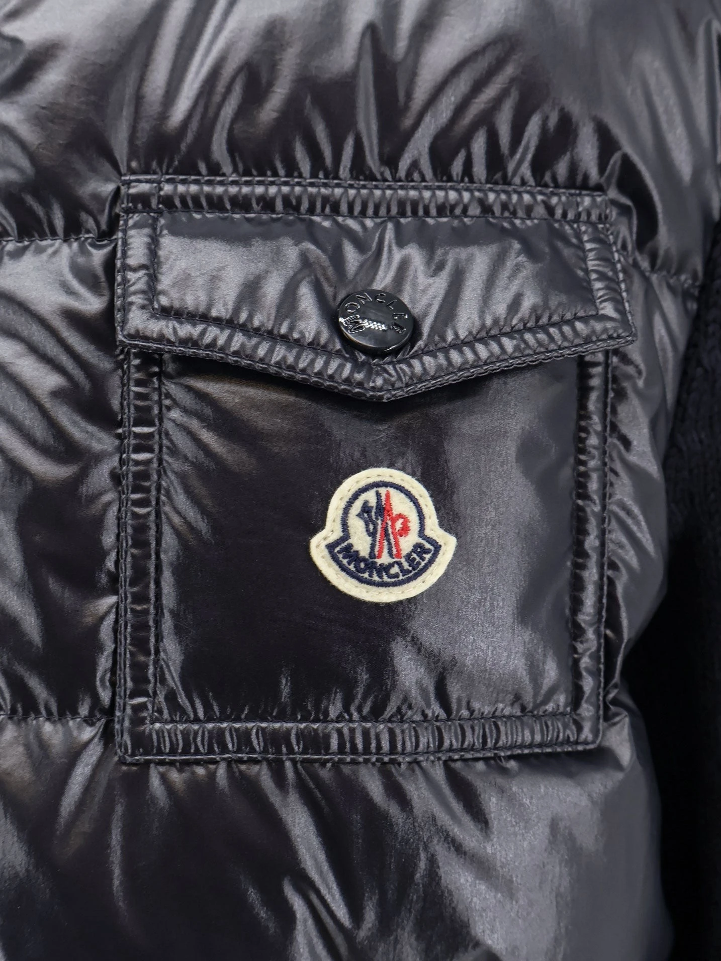Down Jacket with virgin wool inserts.webp