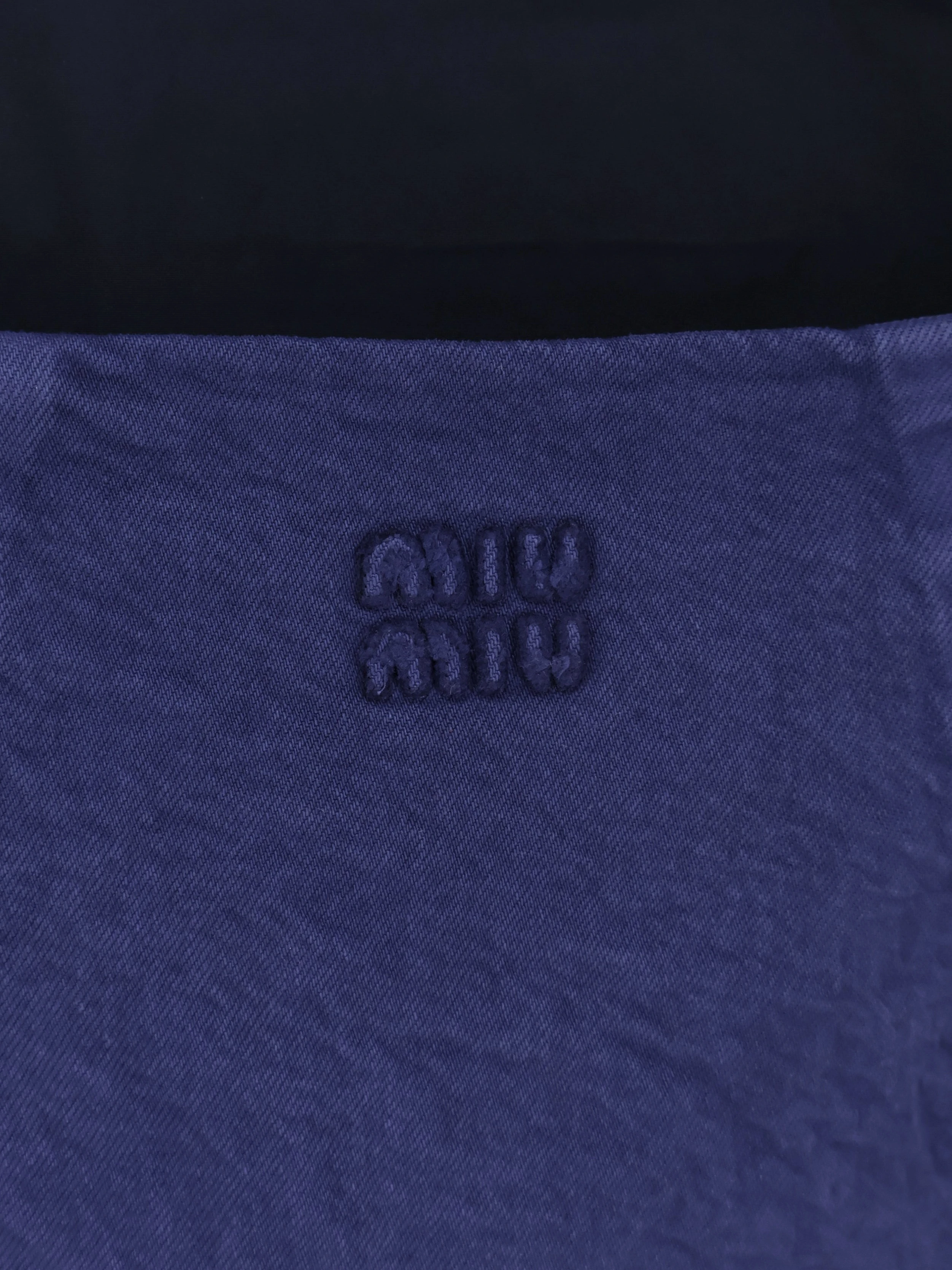 Short denim dress.webp