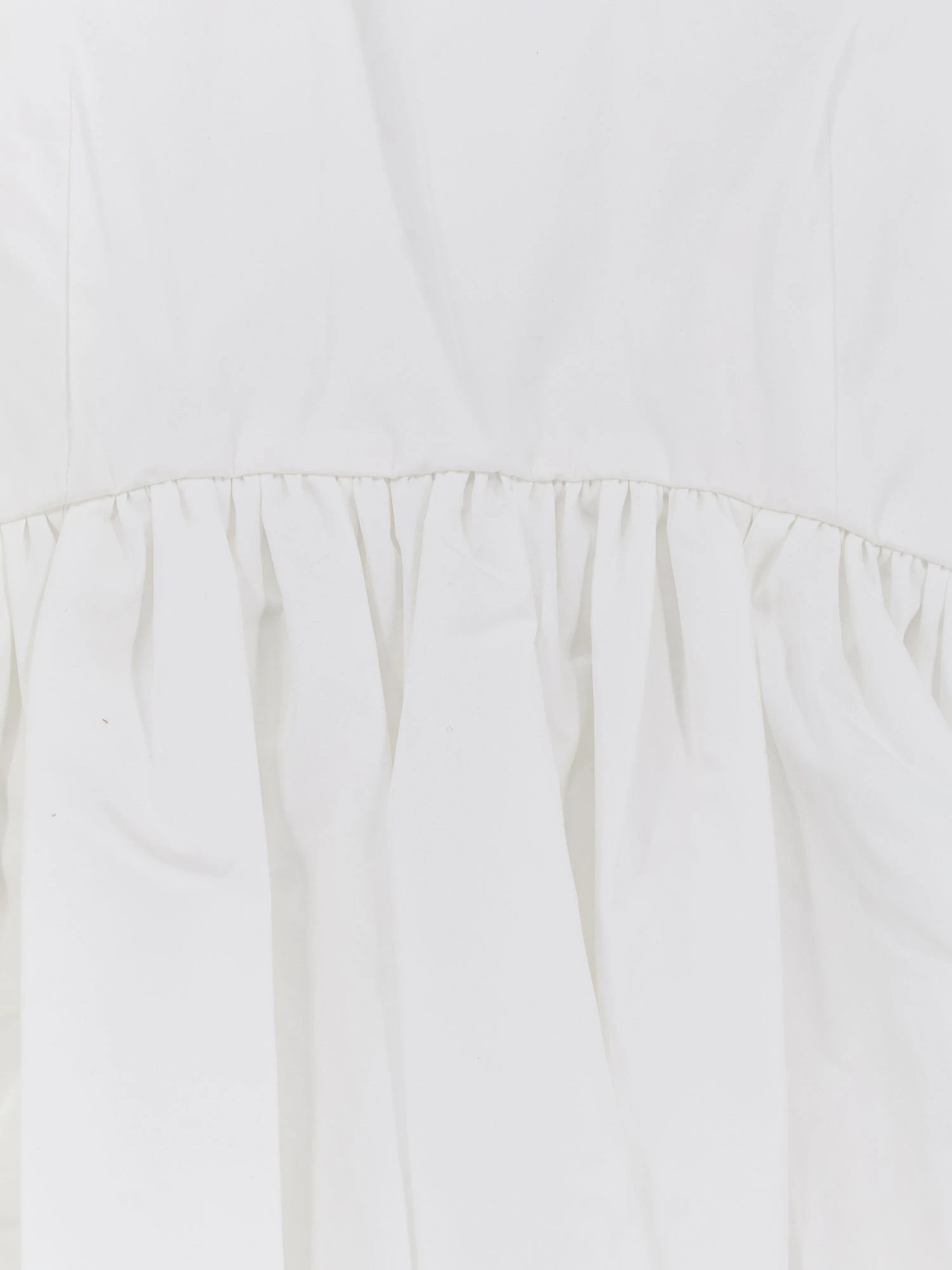 Voluminous peplum cotton tank top.webp