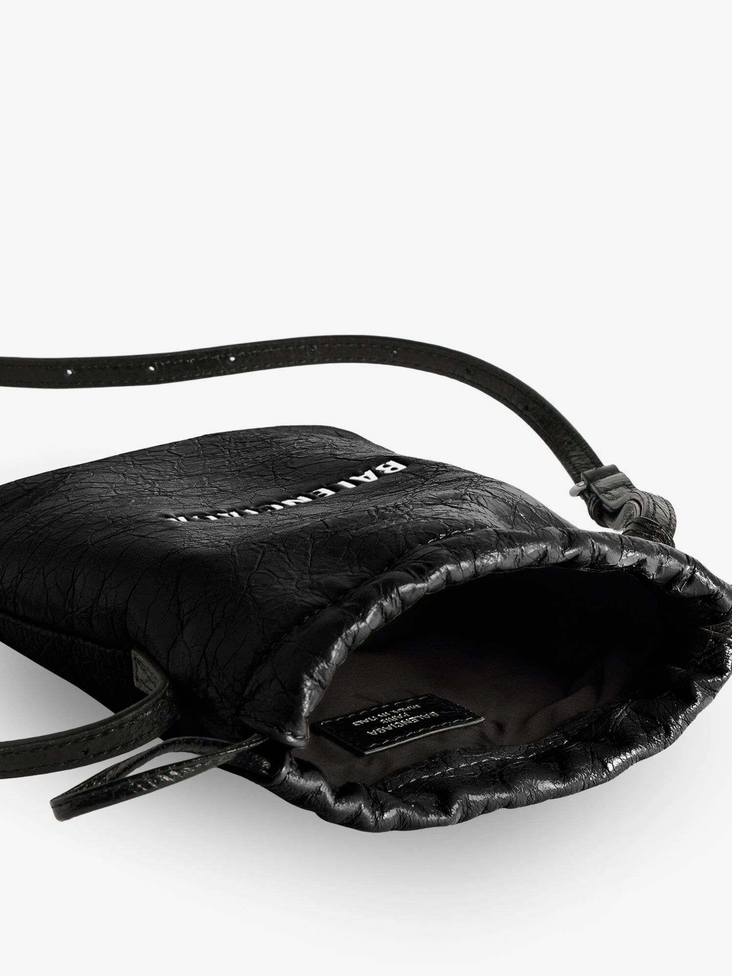 Leather Shopper Phone Holder with lettering logo on the front.webp