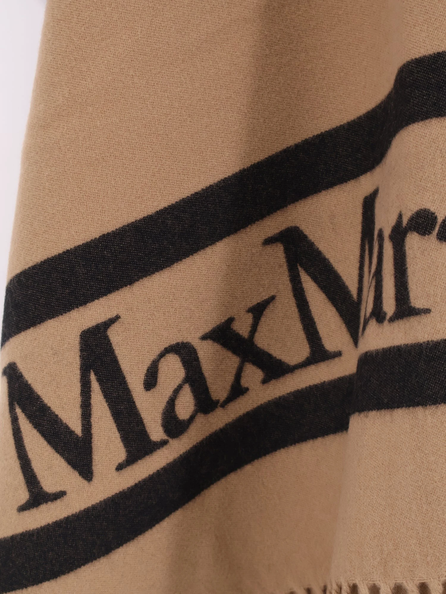 Mxaaris wool cape.webp