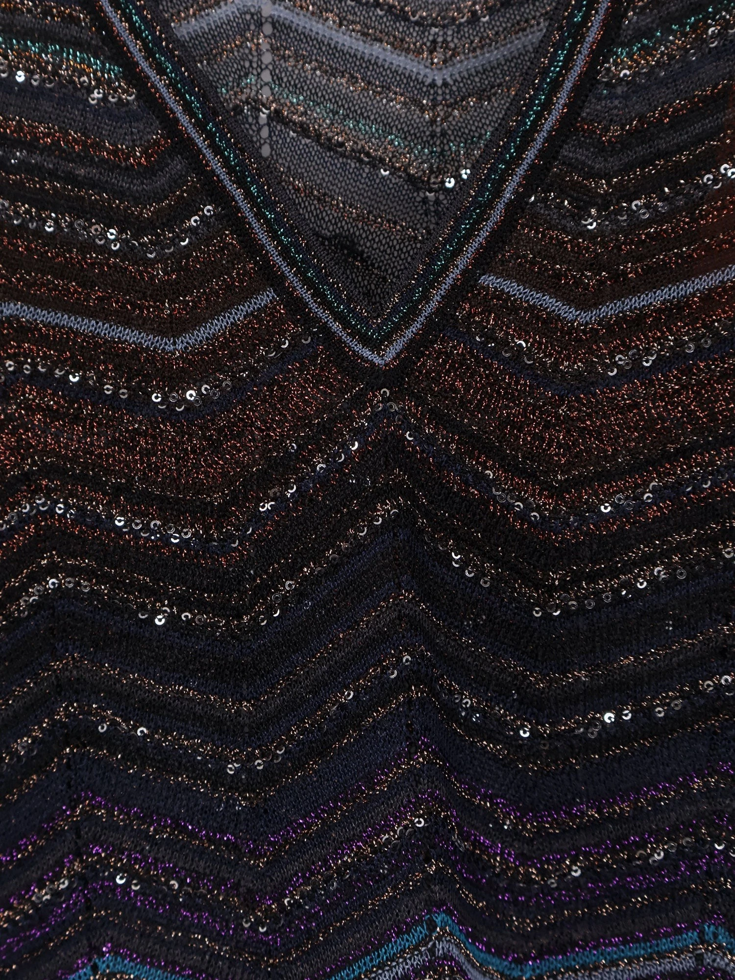 Viscose and metallic fiber sweater.webp