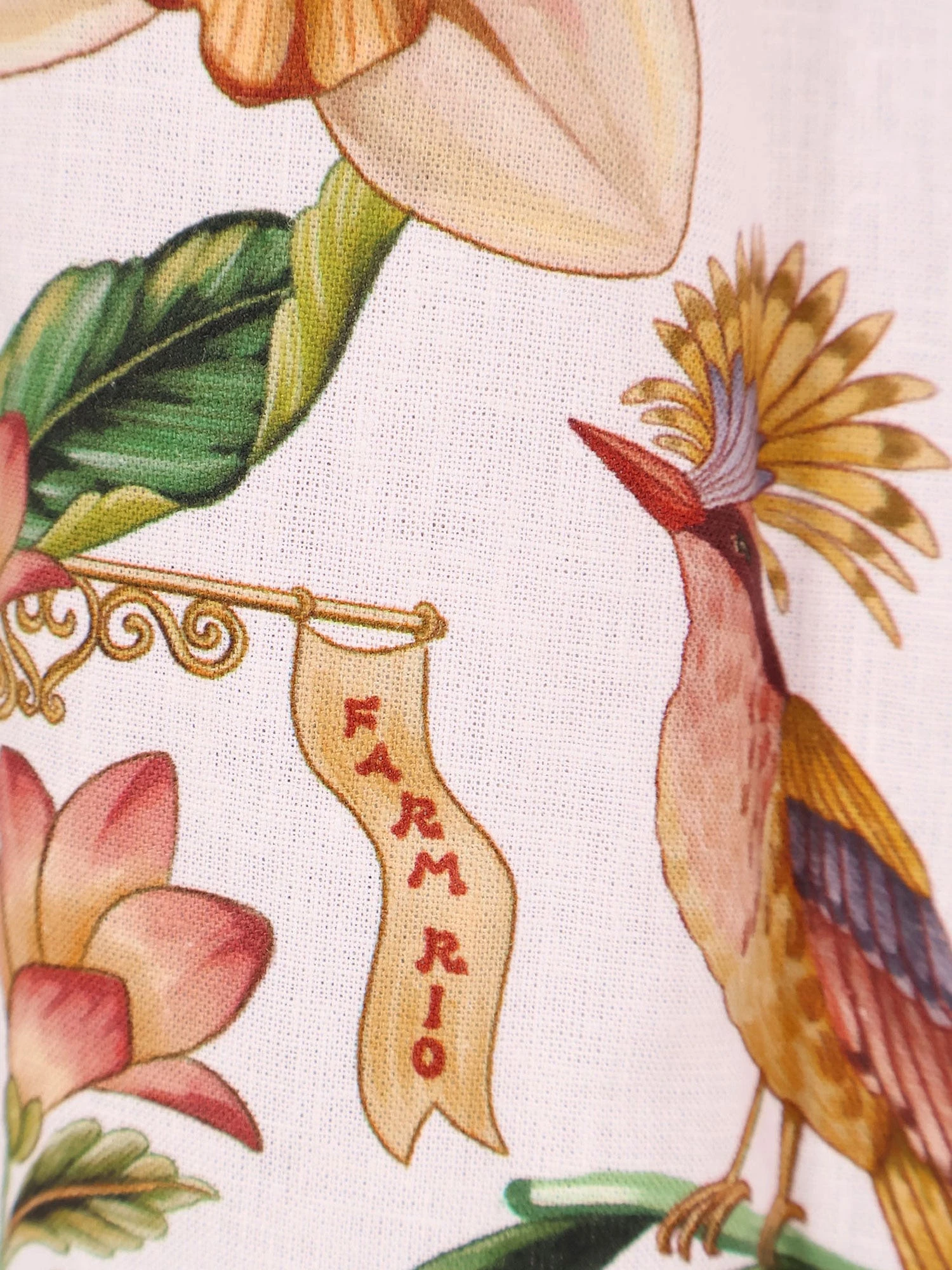 Linen and viscose shirt with floral pattern.webp