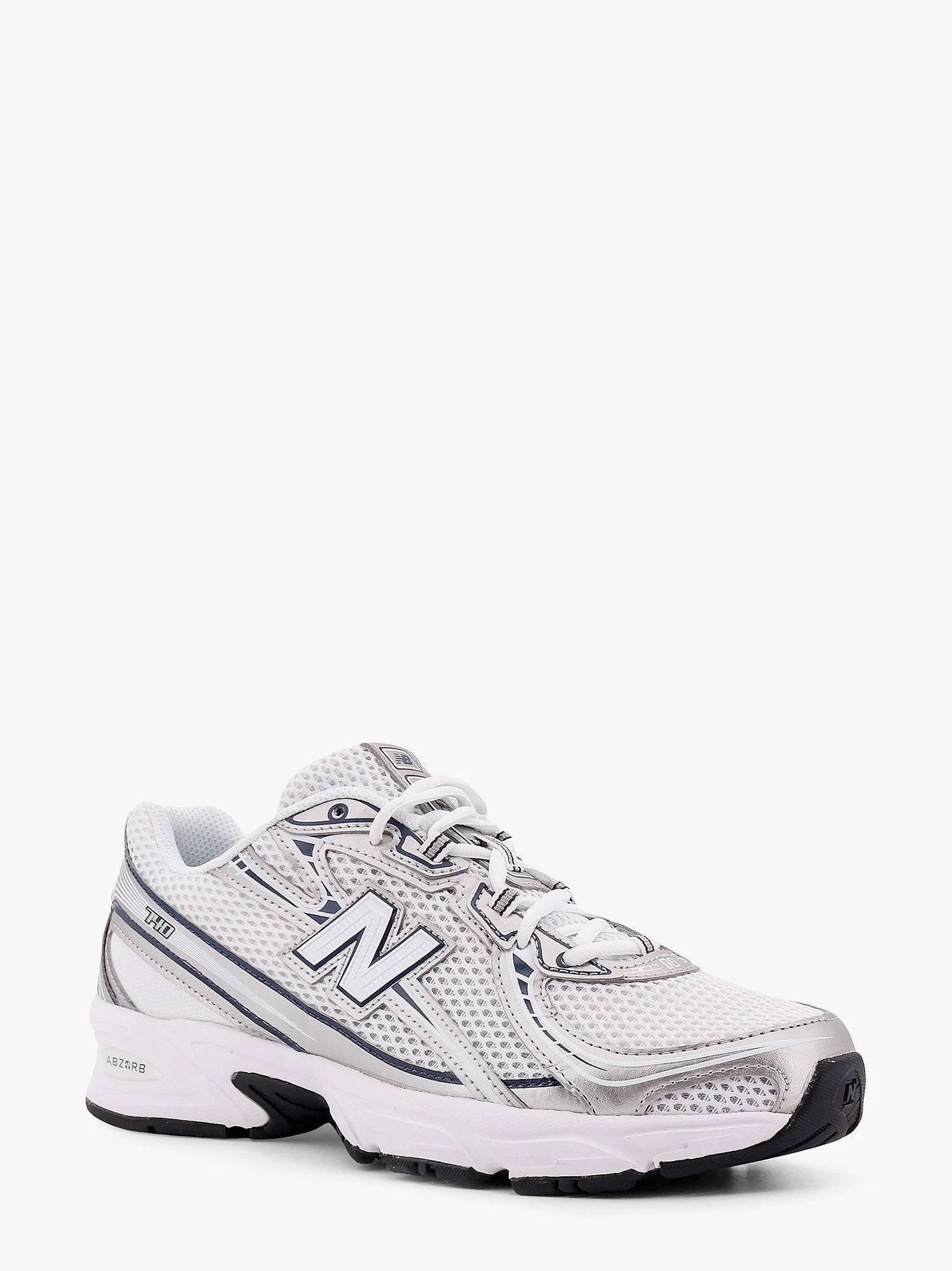 740 mesh sneakers with logo on the side.webp