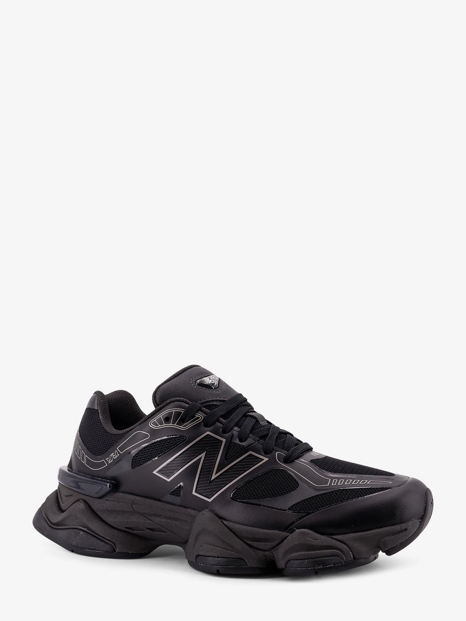740 mesh sneakers with logo on the side.webp