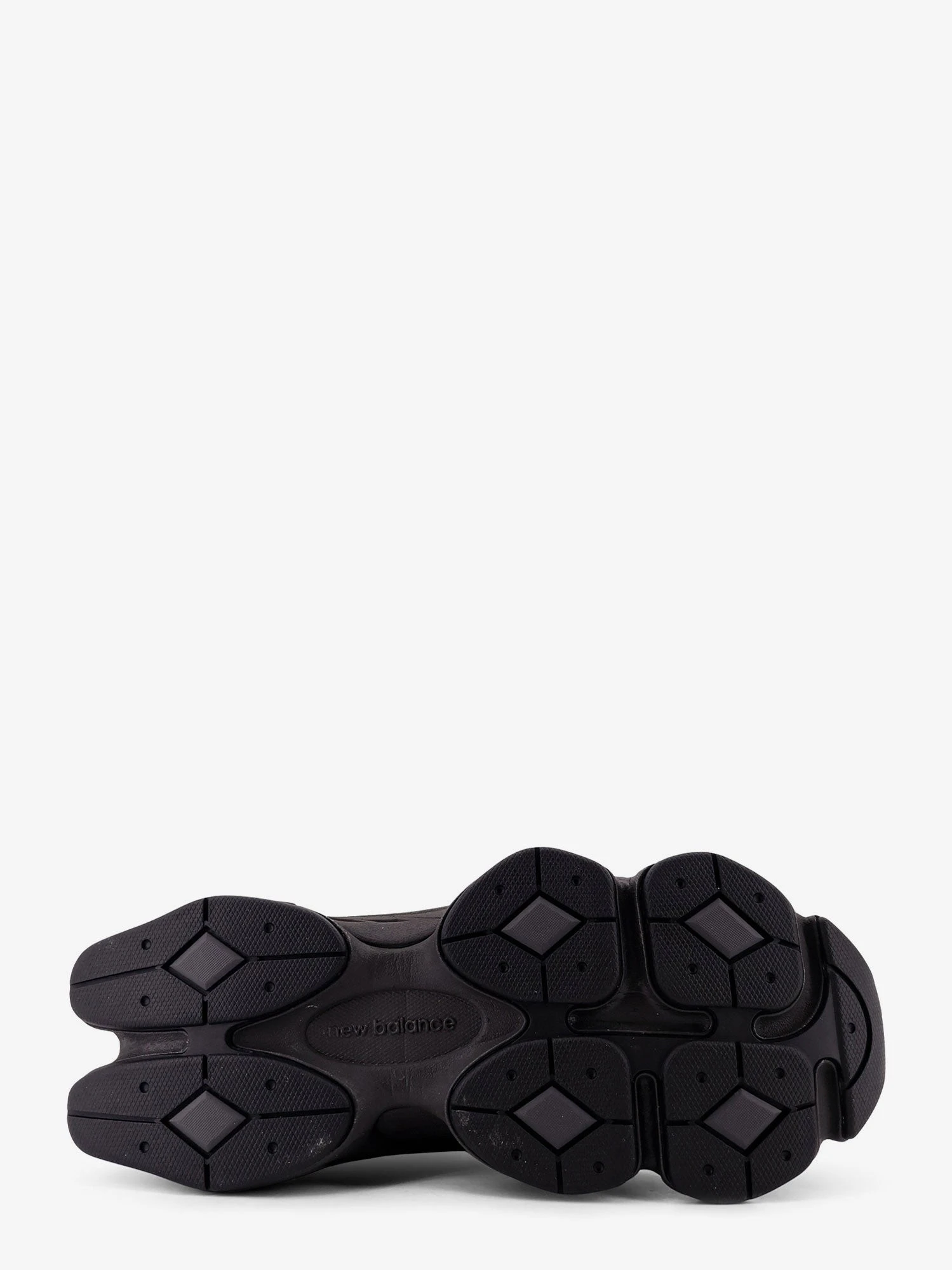740 mesh sneakers with logo on the side.webp
