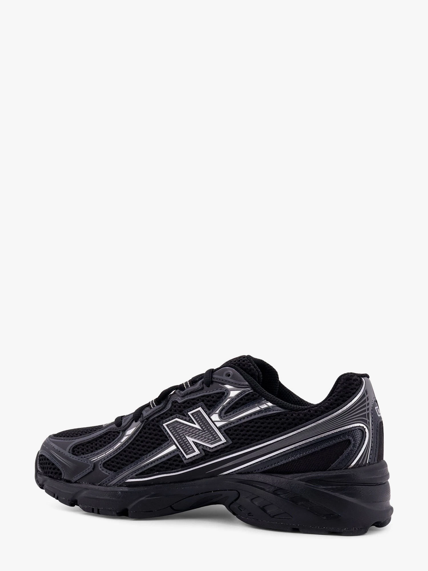 740 mesh sneakers with logo on the side.webp