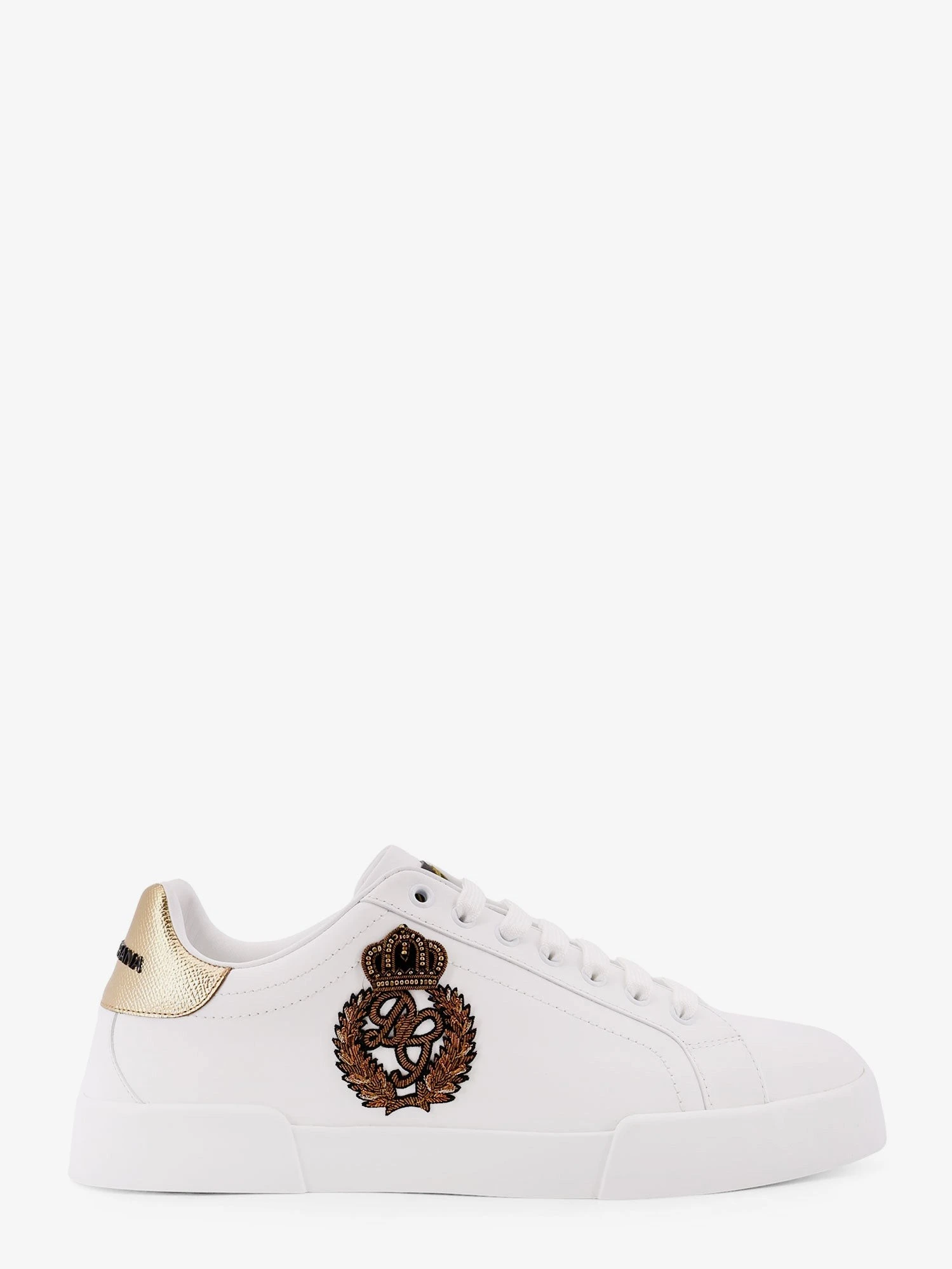 Leather sneakers with iconic patch logo on the side.webp